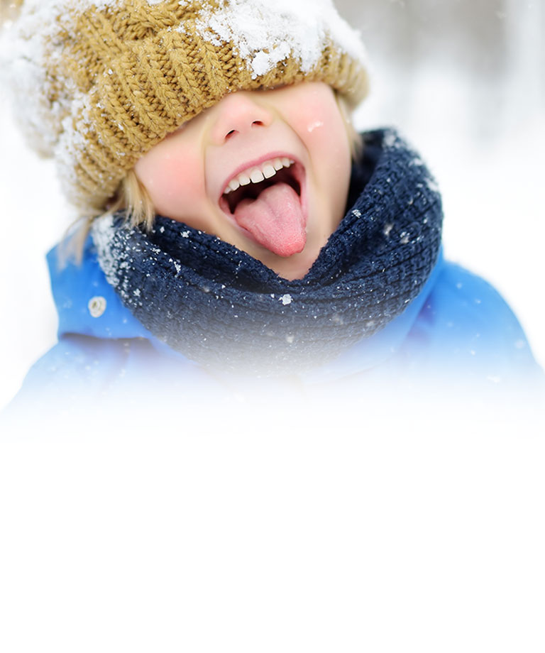 Child Playing in Snow